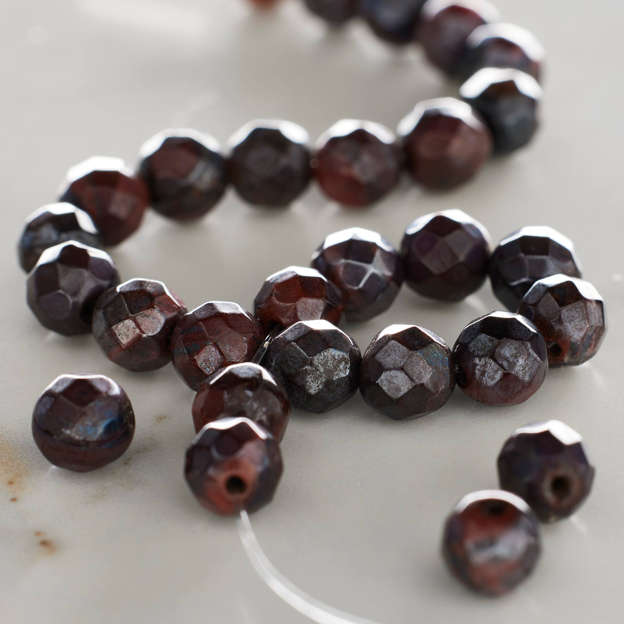 Red Silverite Tiger Eye Faceted Round Beads by Bead Landing™, 6mm